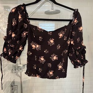 Pink and black floral Reformation top